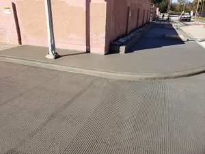 Street corner with concrete sidewalk